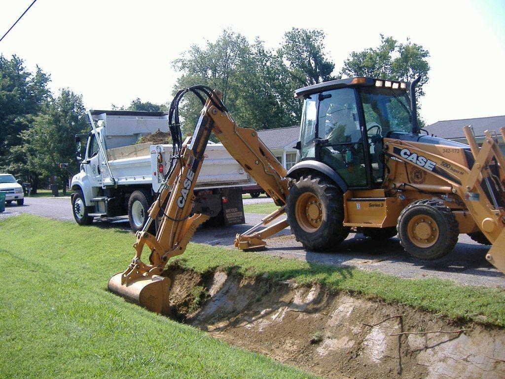 Public Way Improvement employees cleaning ditches